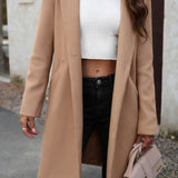 Lang, ensfarvet frakke i uldblanding