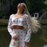 Todelt sæt: cardigan og langærmet nederdel i trykt satin