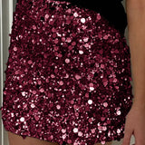 Mini bodycon-nederdel med pailletter forneden