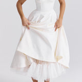 Maxi aftenkjole med V-hals og pufærmer