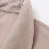 Kort dobbeltradet uldjakke