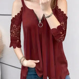 Lotte - Bluse med lynlåslukning og usædvanlige skuldre