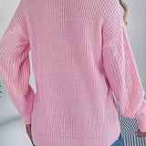 Løstsiddende, langærmet, enkeltradet strikcardigan