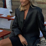 Langærmet vævet læderjakke med V-hals