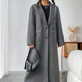 Minimalistisk lang uldfrakke