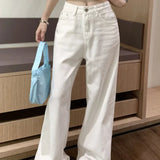 Lyserøde jeans med brede ben og broderet sløjfe