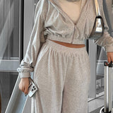 Dame joggingsæt - Kort lynlåsjakke med hætte - Højtaljede bukser