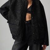 Paillettejakke med høj krave og lommer