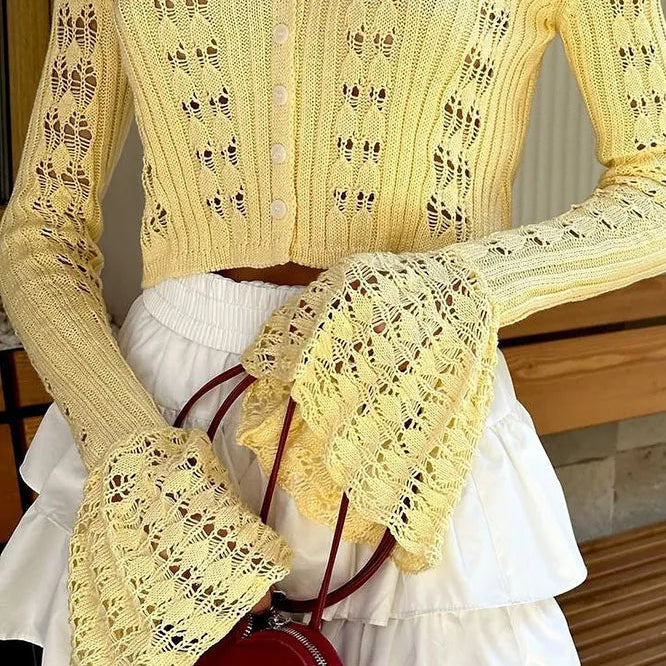 Langærmet vest i åbent strik med V-hals