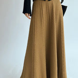 Vintage højtaljet maxinederdel i tekstureret strik