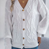 Løstsiddende, langærmet, enkeltradet strikcardigan