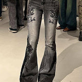 Vintage jeans med svaj og botanisk print