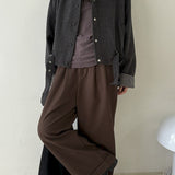 Uldfrakke med opretstående krave og ternede paneler, korte manchetter