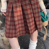 Ternet plisseret nederdel i uld