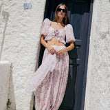 Todelt sæt med lyserødt og hvidt blomsterprint: top med pufærmer og lanternebukser