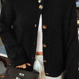 Minimalistisk cardigan med lange ærmer og knapper