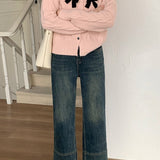 Ribbet cardigan med glitrende sløjfe