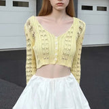 Langærmet vest i åbent strik med V-hals