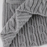 Kabelstrikket nederdel med pomponer