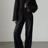 Paillettejakke med høj krave og lommer