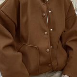 Tyk brun uldfrakke med elastisk kant