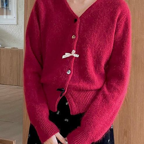 V-hals cardigan med knapper pyntet med butterfly