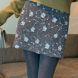 Kort, højtaljet A-formet nederdel med pailletter