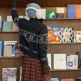 Ternet plisseret nederdel i uld