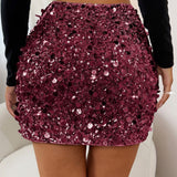 Mini bodycon-nederdel med pailletter forneden