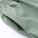 Afslappede højtaljede cargobukser med vide ben og snøre