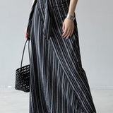 Lang, stribet, højtaljet A-formet nederdel med bindelukning