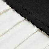 Ærmeløs plisseret kort kjole - Tætsiddende snit - Høj halsudskæring - Elegant og chic