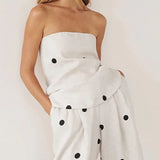 Todelt sæt til kontoret: prikket tubetop og bukser med vide ben