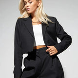 Todelt sæt: slim fit bukser med vide ben til foråret