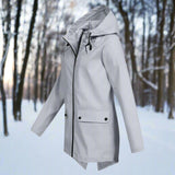 Stilfuld, vejrbestandig og komfortabel regnfrakke med hætte til kvinder