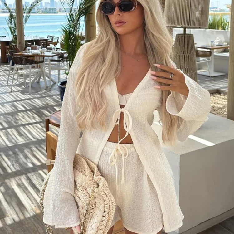 Todelt løstsiddende lyserødt bomulds- og hørsæt til kontoret