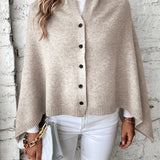 Dameponcho – Blød strik – Løs pasform – Knaplukning – Ribbet finish