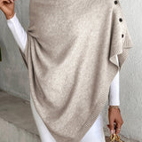 Dameponcho – Blød strik – Løs pasform – Knaplukning – Ribbet finish