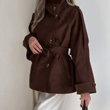 Dobbeltradet frakke med rullekrave og bindebælte