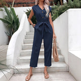 Damejumpsuit – Ærmeløs – V-hals – Bælte i taljen – Knapper – Ankellang