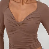 Dametop – V-hals – Slim fit – Lange ærmer – Kort med twistdetalje