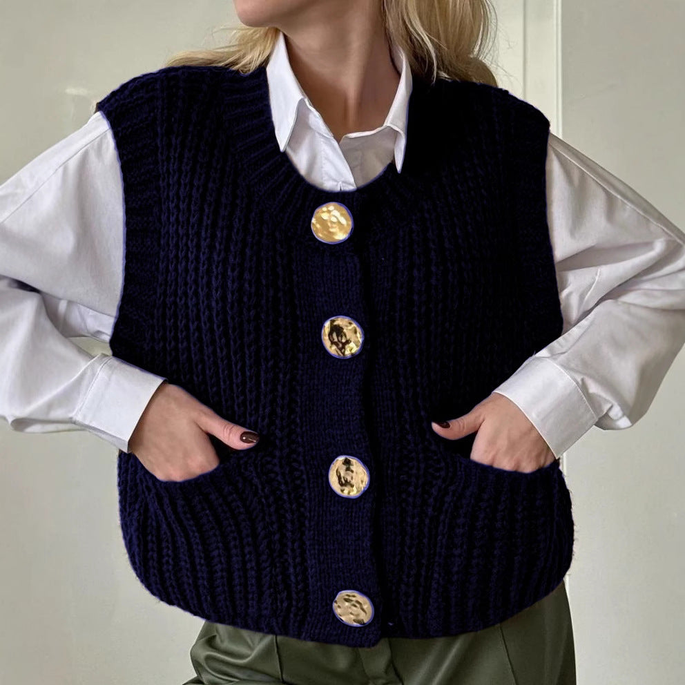 Damestrikcardigan – Oversized pasform – Knaplukning – Ribbet tekstur – Lommer