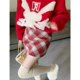 Højtaljet ternet uldnederdel i plus size