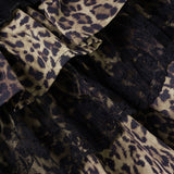 Kort nederdel med leopardprint og flæset blondesløjfe