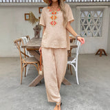 Damejumpsuit – Afslappet pasform – Åndbart stof – Broderet V-hals