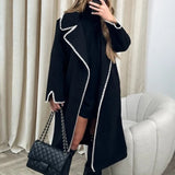 Dame vindjakke – Oversized pasform – Uld – Midt på låret – Skalbroderi