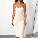 Damekjole – Stropløs strik – Tætsiddende snit – Åben ryg med twistdetalje – Lang