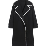 Dame vindjakke – Oversized pasform – Uld – Midt på låret – Skalbroderi