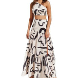 Damesæt i to dele – Asymmetrisk crop top – Lang nederdel med slids og flagrende snit