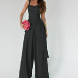 Damejumpsuit – Let hør – Ærmeløs – Justerbar talje – Flagrende vide ben